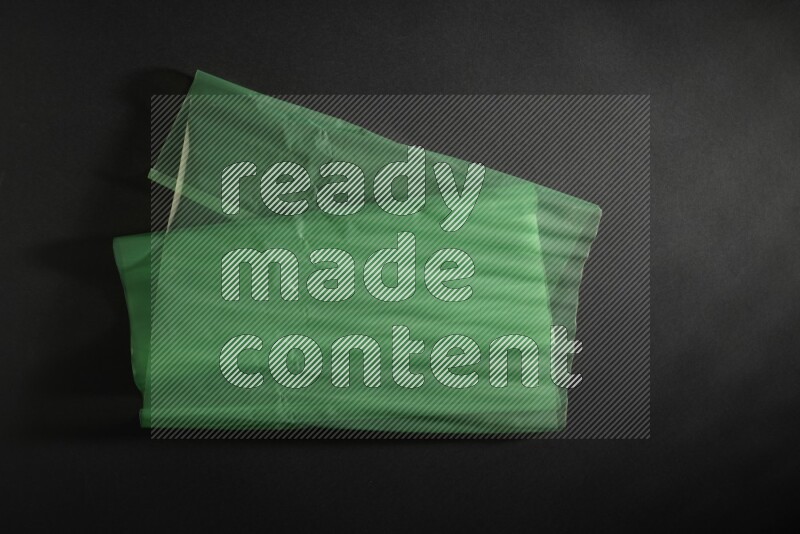 Colored plastic textures on black background