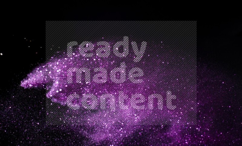 Purple glitter powder isolated on black background