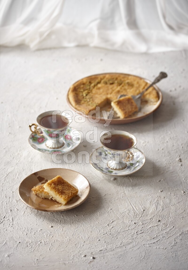 Konafa with tea in a light setup