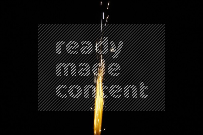 Sparkler candle isolated on black background