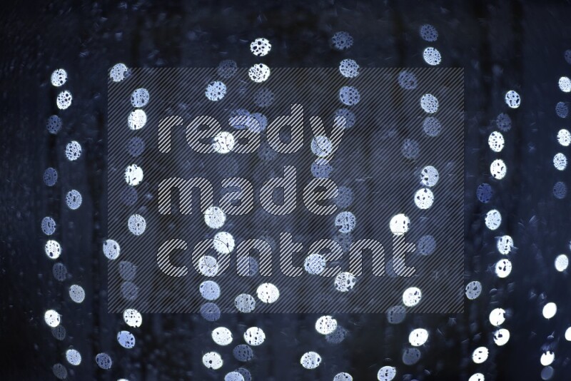 Bokeh light in white with water drops