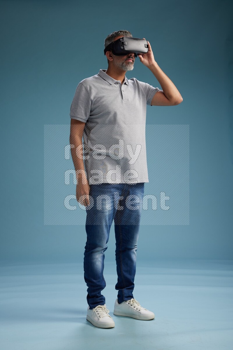 Man Standing Gaming with VR