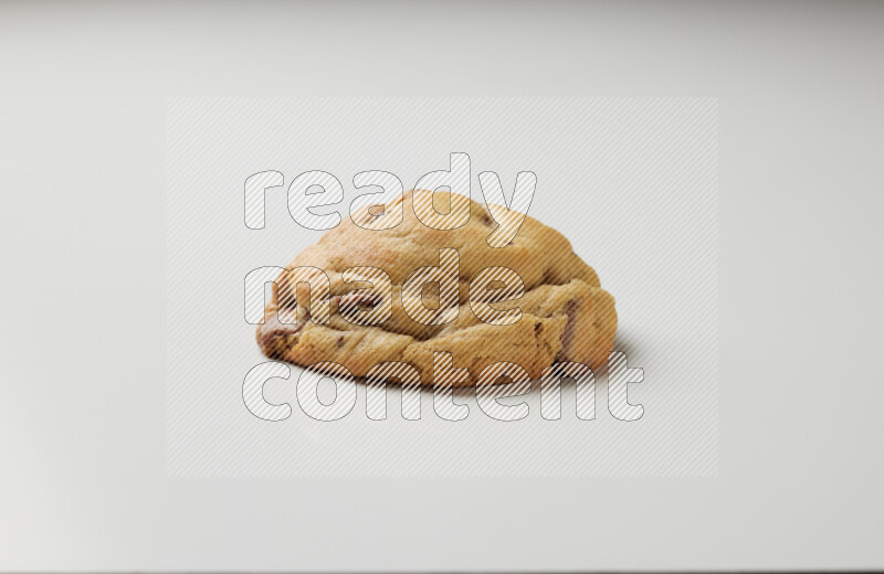 a chocolate chip cookie on a white background