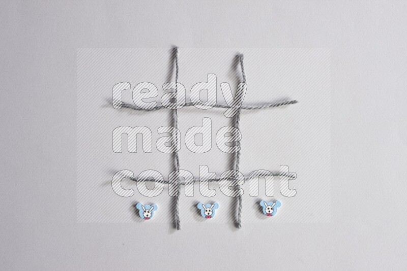 Multicolored buttons placed on grey background