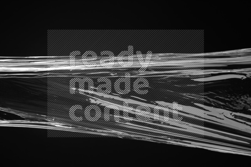 Plastic wrap texture on black background
