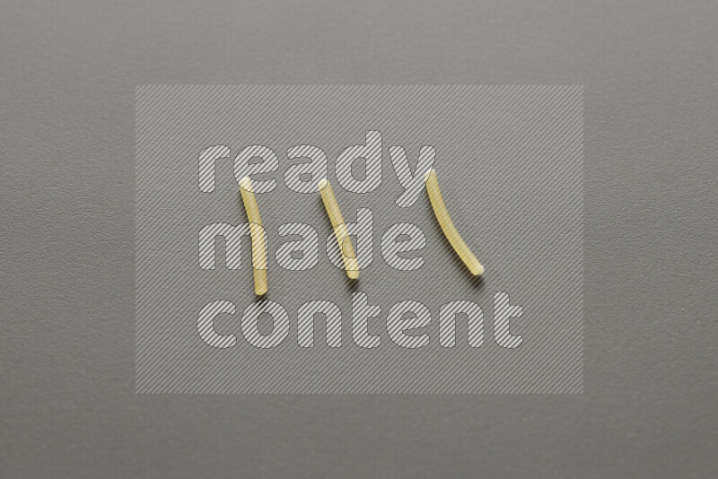 Vermicelli pasta on grey background