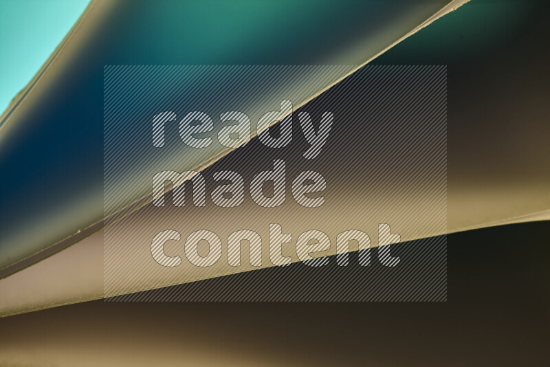 An abstract art piece displaying smooth curves in warm and cold gradients created by colored light