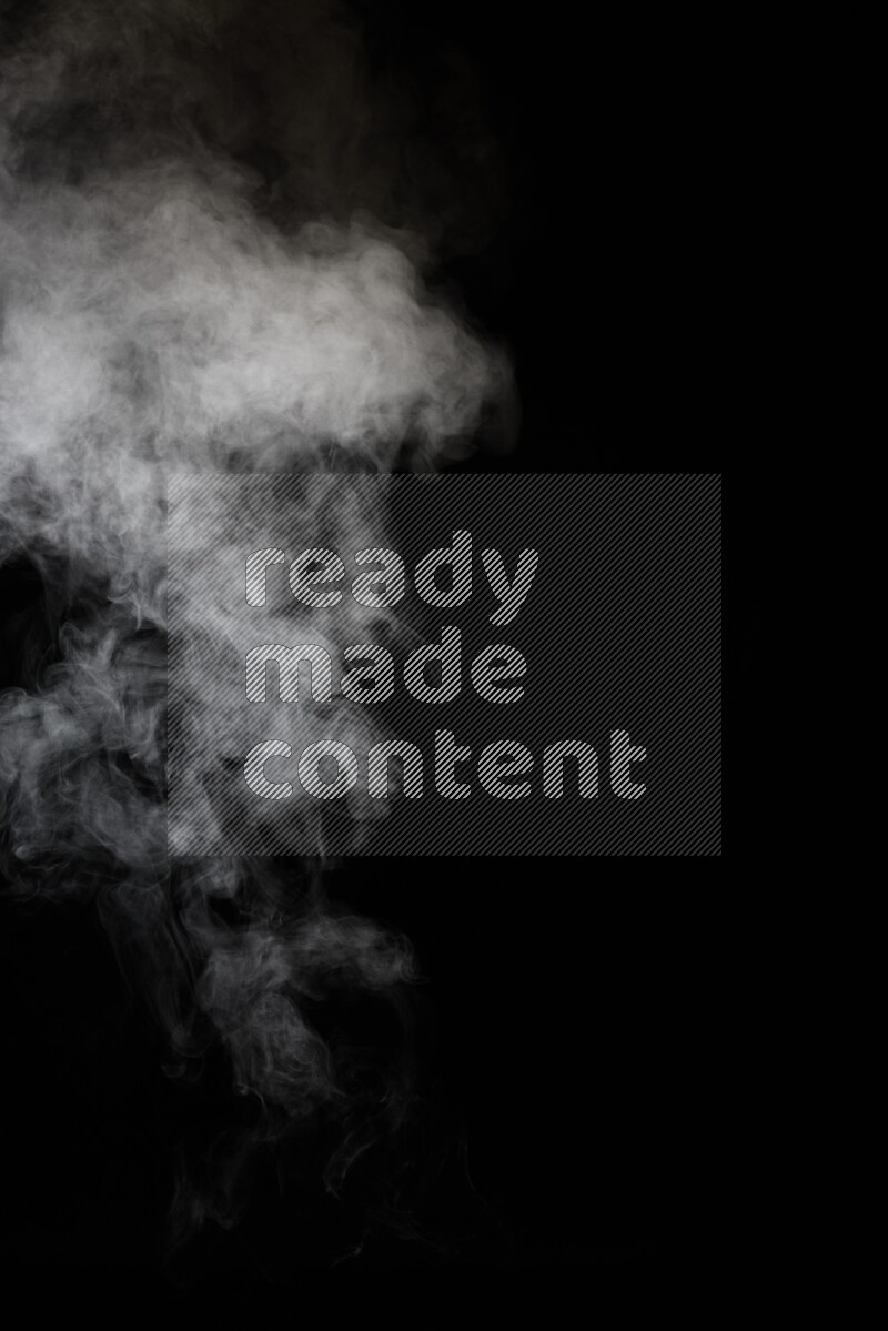 irregular white smoke on black background.