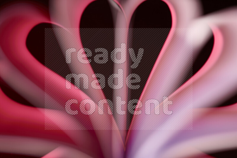 An abstract art piece displaying smooth curves in pink and red gradients created by colored light