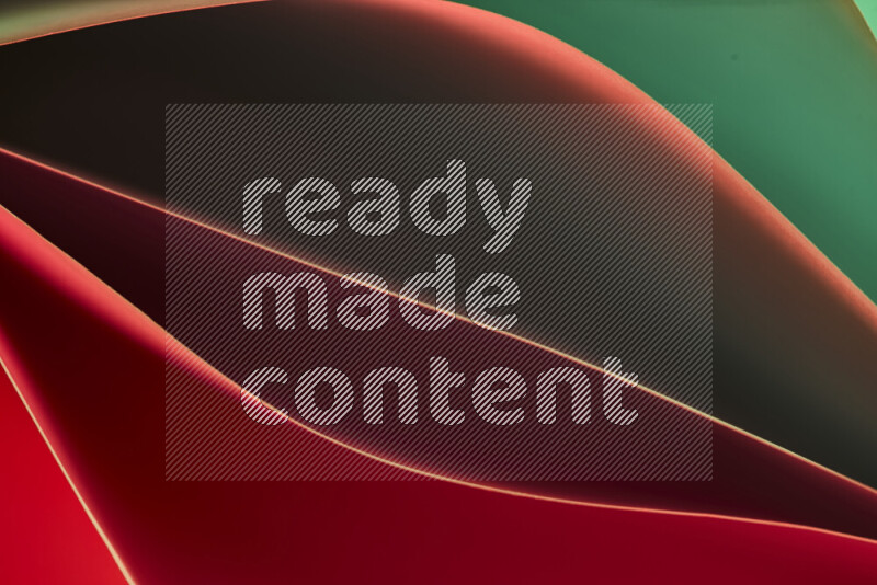 This image showcases an abstract paper art composition with paper curves in green and red gradients created by colored light