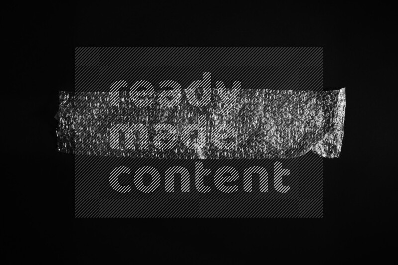 Bubble wrap texture on black background